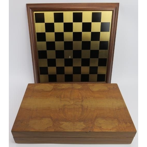 106 - A Medieval themed cast metal chess set and board, late 20th century. 10.2 cm tallest height. 
Condit... 