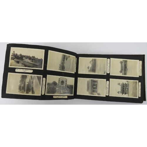 113 - An interesting vintage photograph and postcard album mainly depicting scenes from China and India, c... 