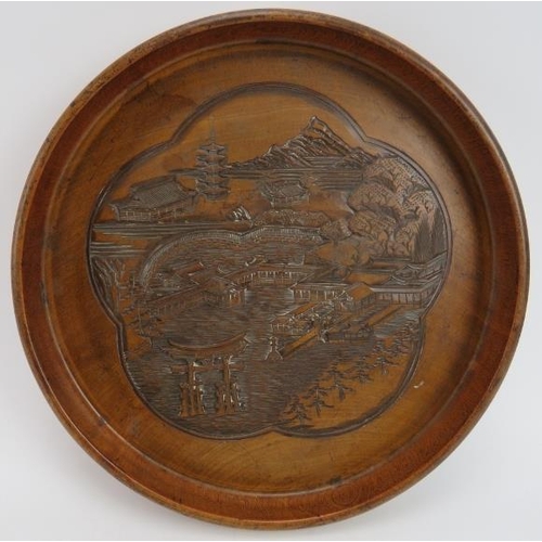 115 - A Japanese carved wood tray with crossed Japanese Empire flags to the reverse, early 20th century. 3... 