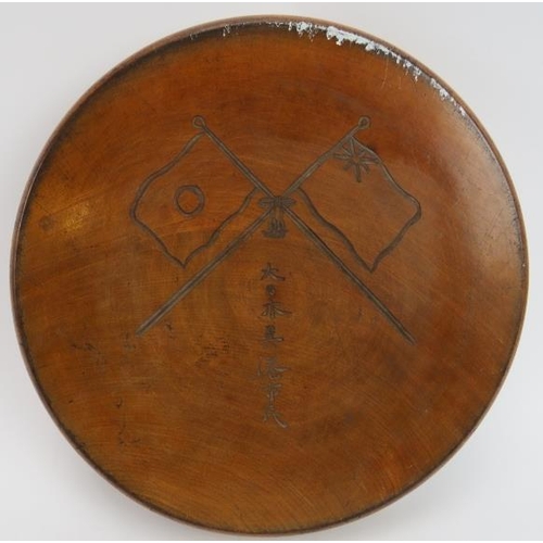 115 - A Japanese carved wood tray with crossed Japanese Empire flags to the reverse, early 20th century. 3... 