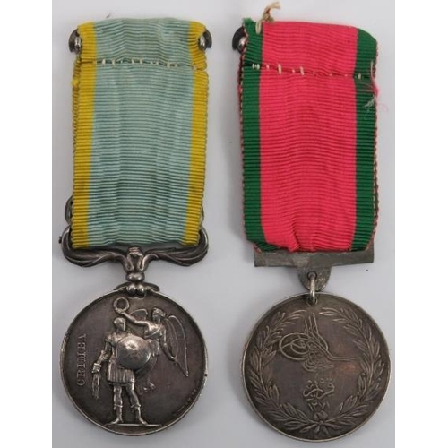 117 - Militaria: A Crimea Medal and Turkish Crimea 1855 Medal. A group of two Crimea medals both awarded t... 