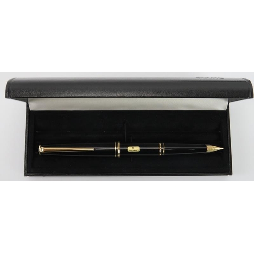 120 - A Montblanc ‘Classic’ black and gold fountain pen. 14K gold medium nib. With original pen case, pres... 