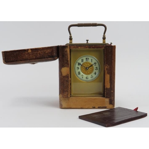 127 - A French brass repeater carriage clock, late 19th century. Housed in a portable leather case. Clock:... 