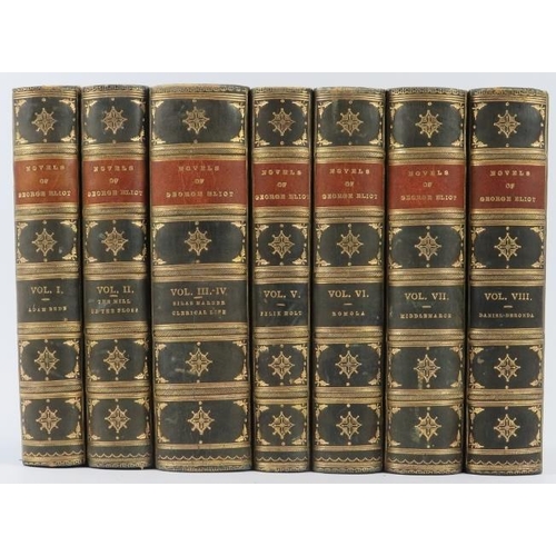 128 - Books: George Eliot [Mary Ann Evans] - A complete set of novels in eight volumes bound into seven bo... 