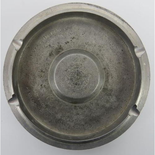 13 - Militaria: A novelty RAF Rolls Royce Merlin engine piston ashtray, circa 1940s. Inscribed ‘Made from... 