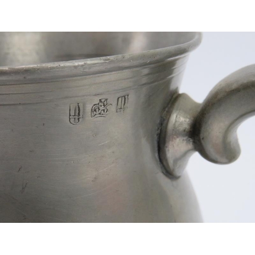 132 - A group of pewter items, 19th century and earlier. See additional images for marks. (9 items) Flagon... 