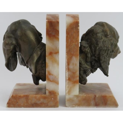 14 - A pair of vintage bronzed spelter and alabaster spaniel and hound dog bookends, 20th century. Both s... 