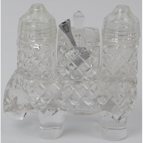 141 - A novelty cut crystal glass elephant condiment cruet set, probably late 19th/early 20th century. Wit... 