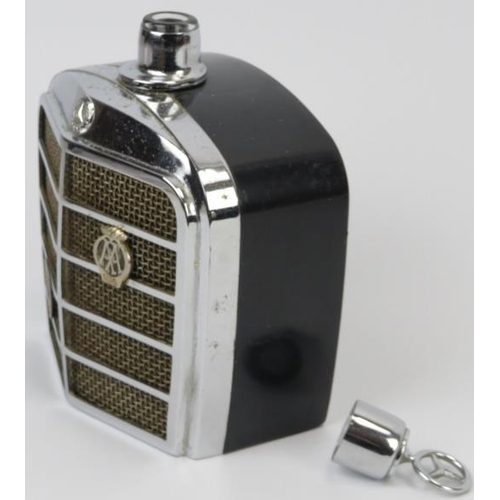 159 - Automobilia: A vintage Mercedes Benz car grill drinks decanter flask and two car bonnet emblems, mid... 