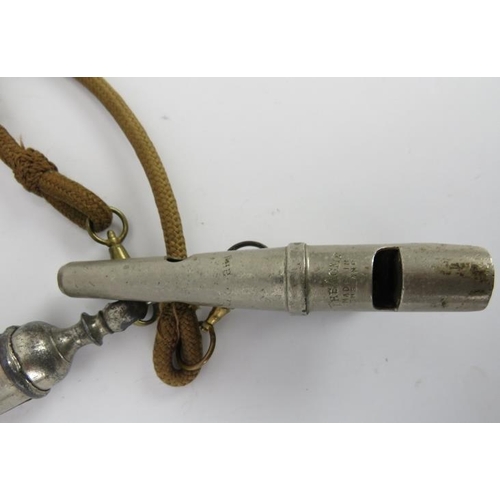 16 - A rare vintage Acme three note double sheep dog whistle. Attached to a chord with an additional whis... 