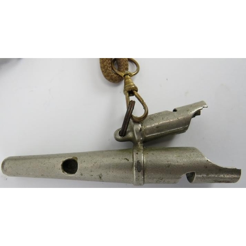 16 - A rare vintage Acme three note double sheep dog whistle. Attached to a chord with an additional whis... 