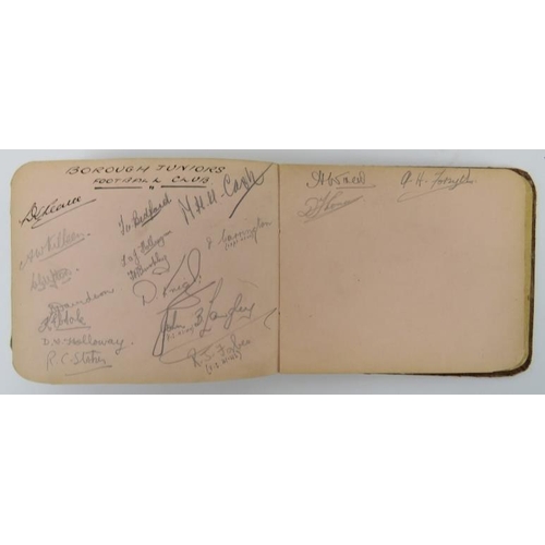 160 - Sporting memorabilia: An Autograph album containing football and cricket players signatures, circa 1... 