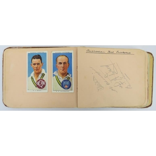 160 - Sporting memorabilia: An Autograph album containing football and cricket players signatures, circa 1... 