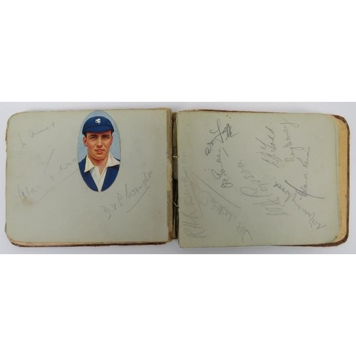 160 - Sporting memorabilia: An Autograph album containing football and cricket players signatures, circa 1... 