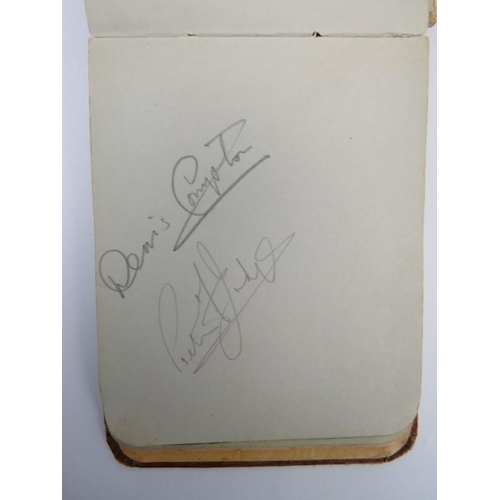 160 - Sporting memorabilia: An Autograph album containing football and cricket players signatures, circa 1... 