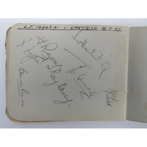 160 - Sporting memorabilia: An Autograph album containing football and cricket players signatures, circa 1... 