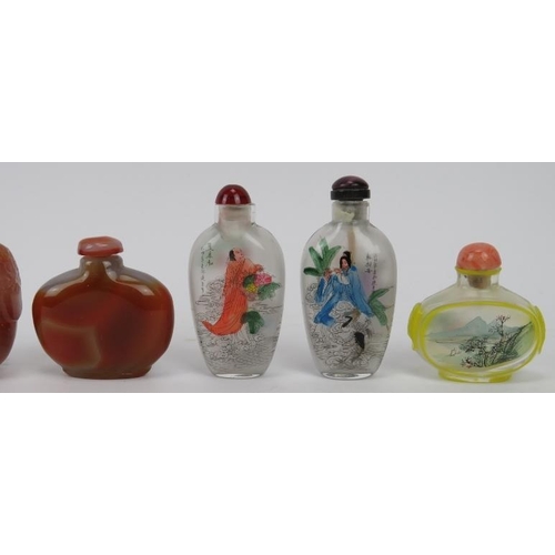 168 - A group of Chinese porcelain, glass and carved agate snuff bottles, 20th century. (9 items) 8.3 cm t... 