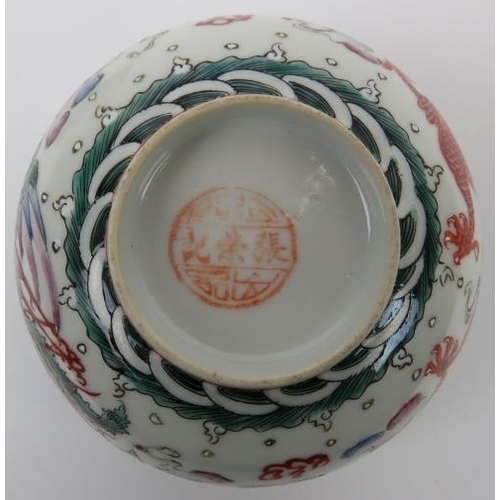 172 - Two Chinese enamelled porcelain bowls, 20th century. Each painted with a confronting dragon and phoe... 