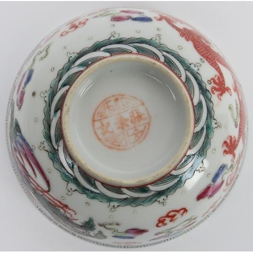 172 - Two Chinese enamelled porcelain bowls, 20th century. Each painted with a confronting dragon and phoe... 