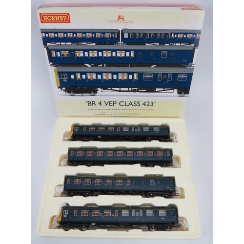 193 - Toys: A Hornby BR-4 VEP Class 423 Blue Livery four car unit. Box included. 
Condition report: Good v... 