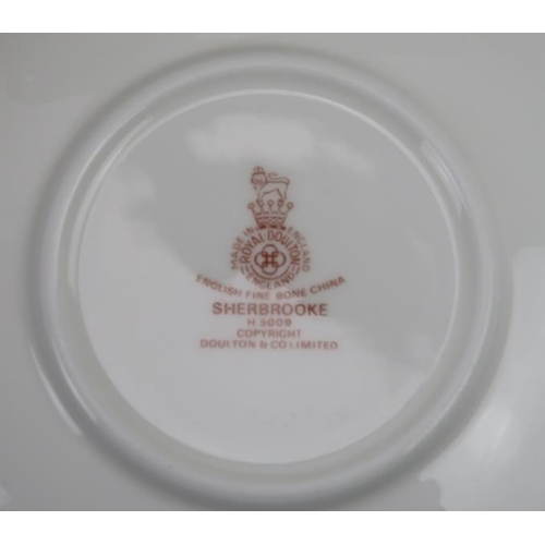 198 - A Royal Doulton ’Sherbrooke’ pattern porcelain tea, coffee and dinner part service. (Quantity).
Cond... 