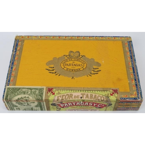 2 - A box of thirteen vintage Partagas Cuban Havana cigars. Each cigar wrapped in cellophane. 
Condition... 