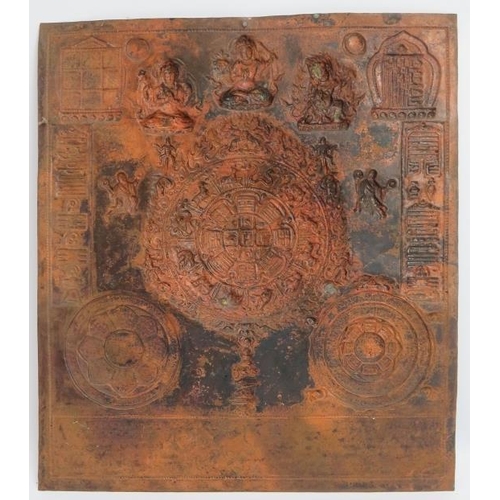 209 - A Tibetan Buddhist embossed copper Mandala panel, probably 19th century. Depicting Buddhist symbols ... 