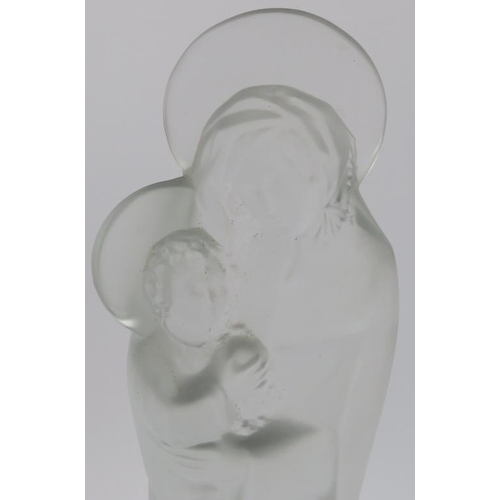 23 - A Lalique frosted glass Madonna and Child. Supported on a black glass base and signed ‘Lalique Franc... 