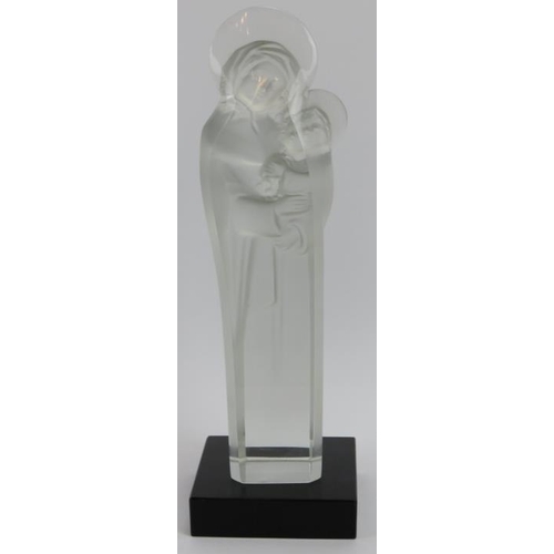 23 - A Lalique frosted glass Madonna and Child. Supported on a black glass base and signed ‘Lalique Franc... 