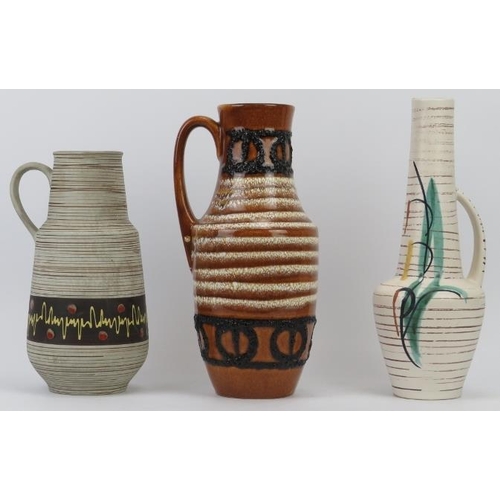 231 - Three West German ceramic jugs, mid 20th century.  cm tallest height. 
Condition report: Light age r... 