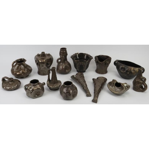 235 - A group of Bretby bronzed glaze ceramic wares, 20th century. A variety of objects glazed to simulate... 