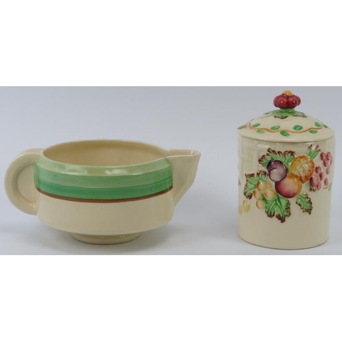 253 - A Clarice Cliff banded jug and and an AJ Wilkinson Royal Staffordshire Pottery jam pot with cover. (... 