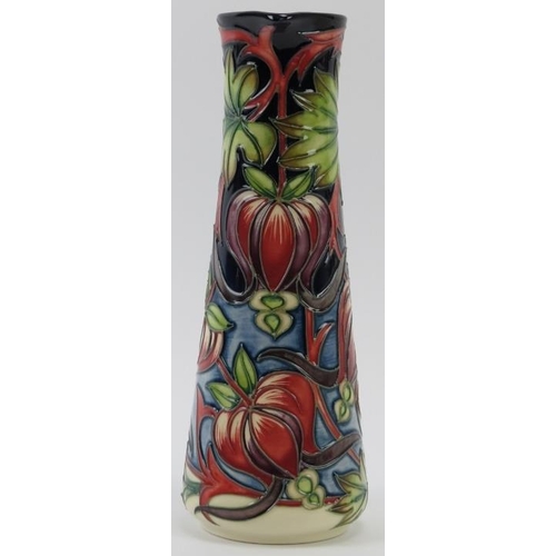 279 - A Moorcroft Red Ribbons pattern ewer designed by Shirley Hayes, circa 2004. Painted and impressed fa... 