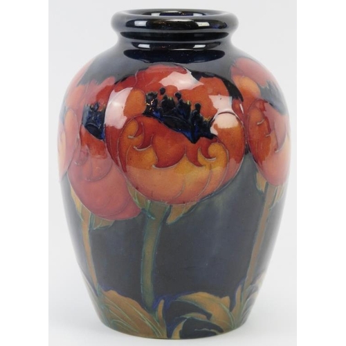 282 - A William Moorcroft Bog Poppy pattern vase, circa 1920’s. Initialled W. M. in blue with impressed fa... 