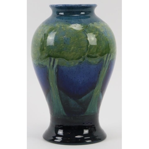 283 - A William Moorcroft Moonlit Blue pattern vase, circa 1920’s. Initialled W. M. in blue with impressed... 