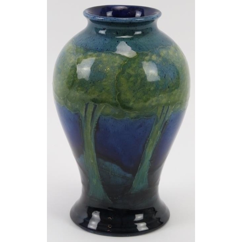 283 - A William Moorcroft Moonlit Blue pattern vase, circa 1920’s. Initialled W. M. in blue with impressed... 