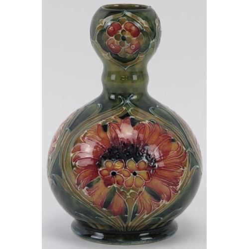 290 - A William Moorcroft Macintyre Burslem Cornflower pattern knopped vase, circa 1904. Signed W. Moorcro... 