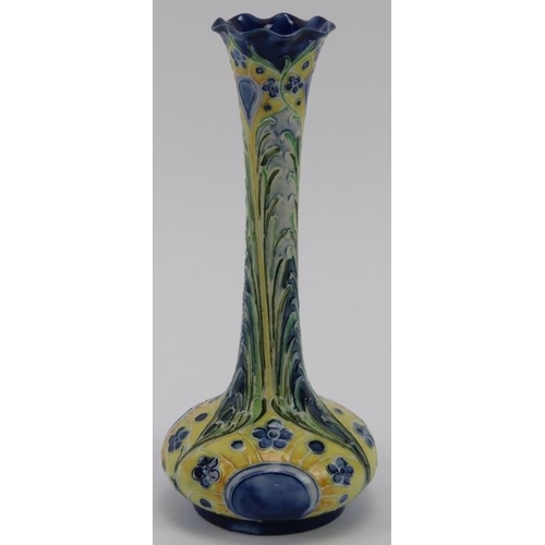 292 - A William Moorcroft Florian Ware Peacock pattern vase, circa 1903.  Initialled W. M. des in green wi... 