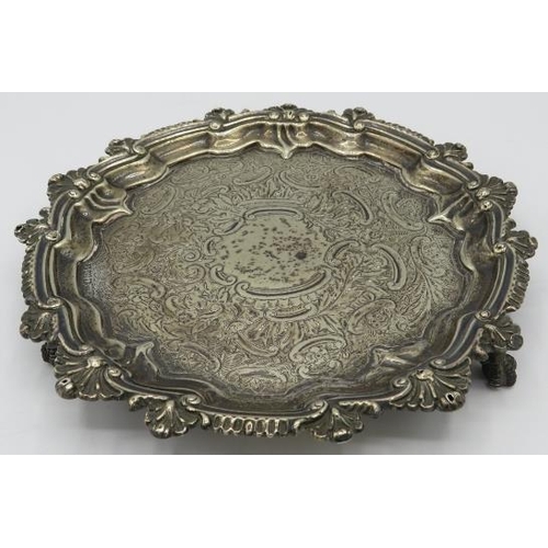 308 - A silver card tray with pie crust & shell decorated edge and claw feet, centre engraved decoration, ... 