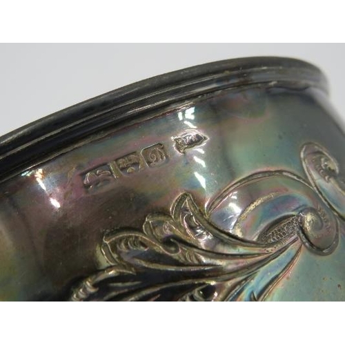 309 - A silver rose bowl, heavily embossed with flowers & scrolls, Chester 1904, Walker & Hall. Approx wei... 