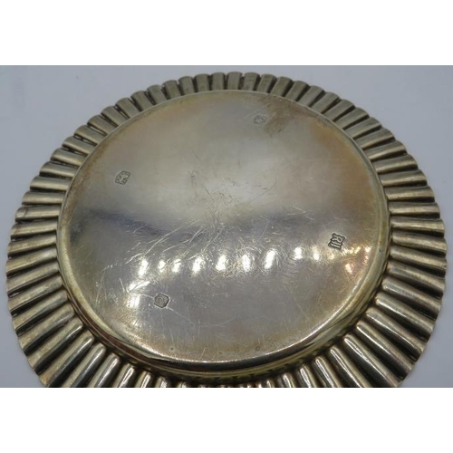 311 - A small silver circular dish, Sheffield 1972. Approx weight 3.5 troy oz/109 grams.
Condition report:... 