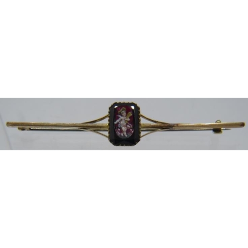 315 - A 9ct yellow gold enamelled amethyst coloured glass bar brooch. Central stone approx 15mm x 8mm. App... 