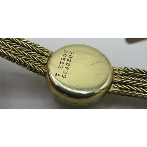 316 - A ladies 9ct gold watch 'Universal Genève' on a 9ct gold strap. Approx weight 20.6 grams.
Condition ... 