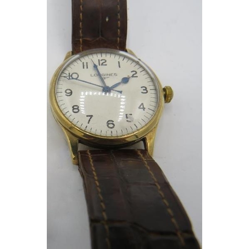 322 - A 9ct gold Longines vintage wristwatch on a leather strap. Approx weight 38 grams.
Condition report:... 