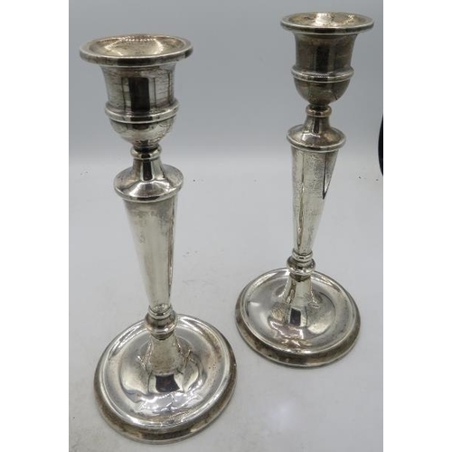 333 - A pair of silver candlesticks, Birmingham 1986 & 1987. Approx 10