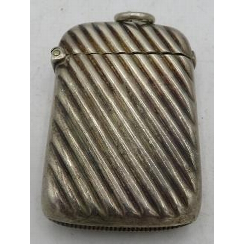 345 - A silver ribbed vesta case 'From Tommy to Tommy', Sheffield 1898.