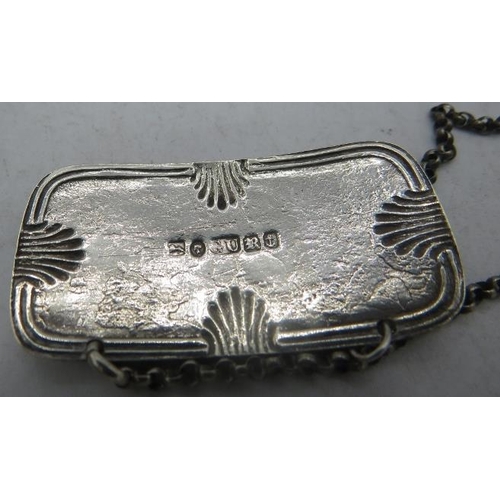 346 - A Victorian silver sherry decanter label, Birmingham 1840, George Unite. Approx weight 6 grams.
Cond... 