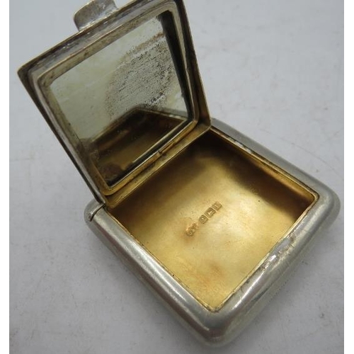 349 - A small square silver compact with mirror and gilded interior, Birmingham 1916. Approx weight 32 gra... 