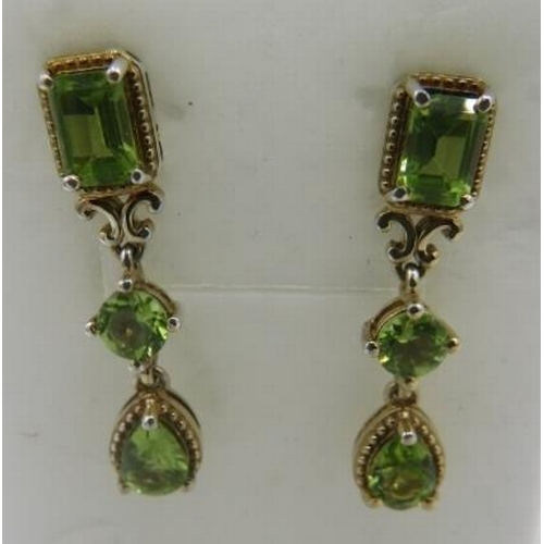 352 - Peridot earrings, post back, pear, round and octagon cut stones, 30mm length. 14k yellow gold plated... 