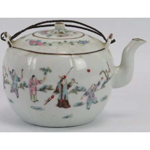 36 - A Chinese Famille Rose porcelain teapot and cover, late 19th/early 20th century. Finely painted depi... 